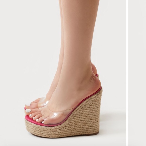 A pair of wedges featuring an open almond toe, clear vamp, platform, - Picture 2 of 2